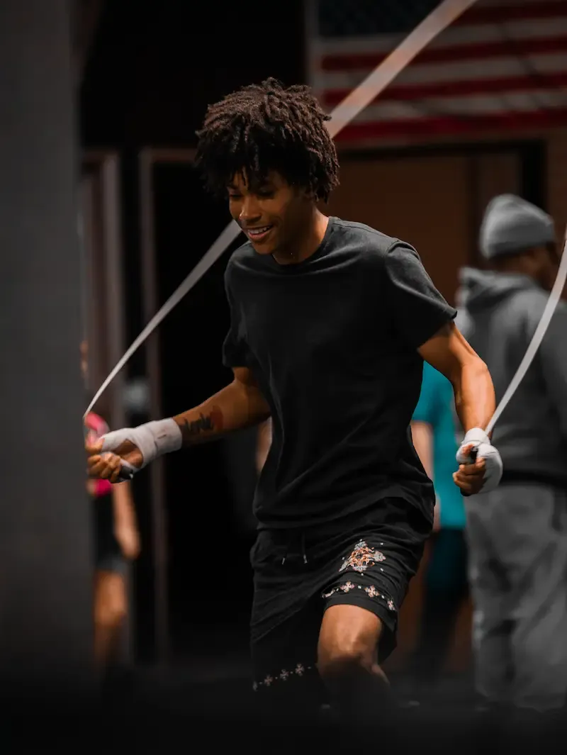Boxer training with jump rope at Lions Den